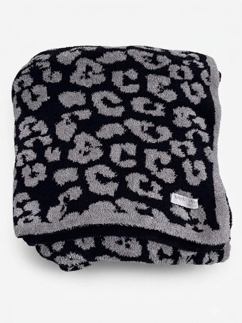 Barefoot Dreams CozyChic Barefoot in the Wild Throw Blanket in Charcoal Leopard